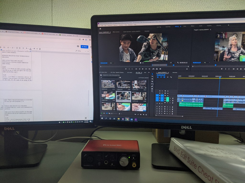 Dual-monitor edit suite running Premiere Pro with an audio interface on the desk