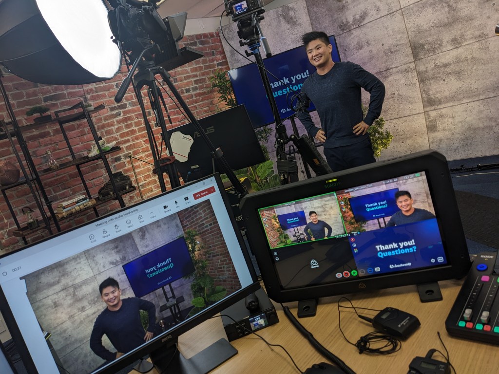 Ryan in the Headversity livestream studio surrounded by cameras, lights, and monitors